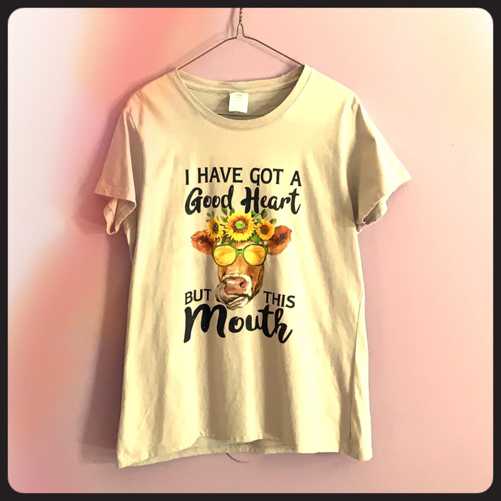 Graphic T-shirt. Cute cow with flower crown.